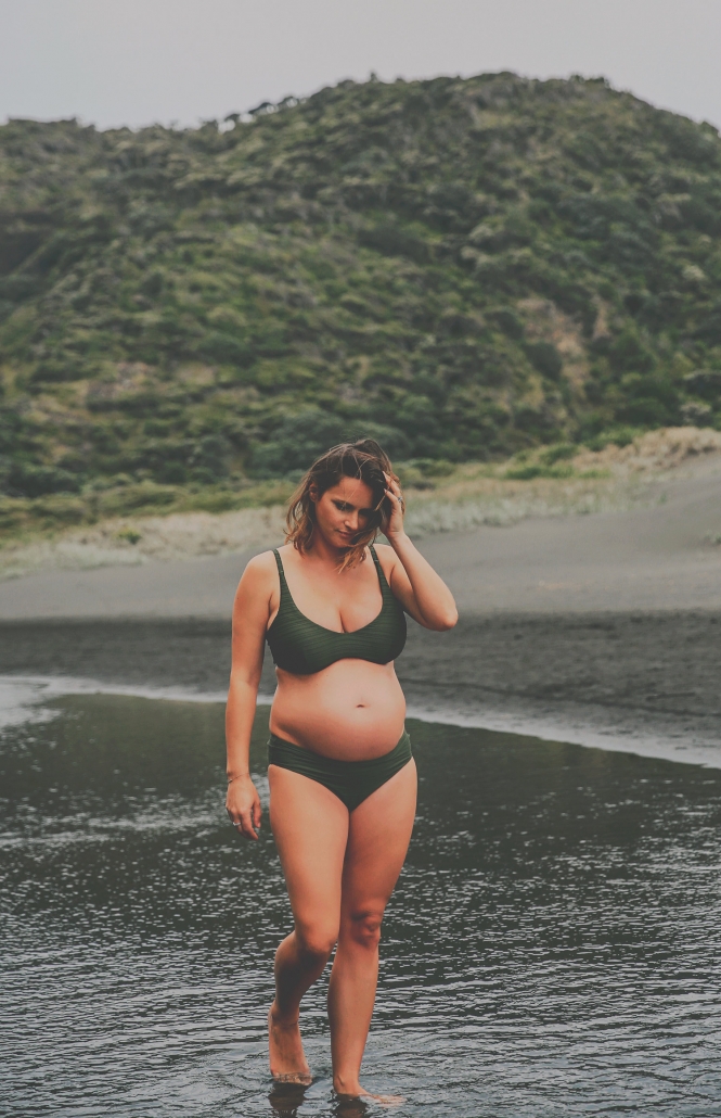 Image of a pregnant woman on a beach